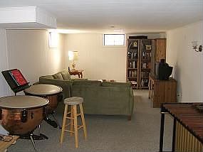 Lower Level includes finished family room with full bath.