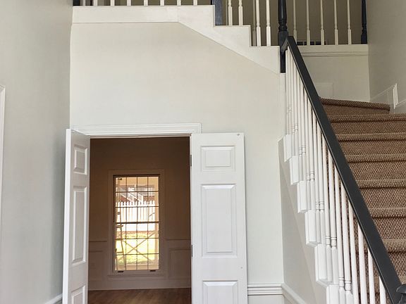 Foyer and staircase with vie