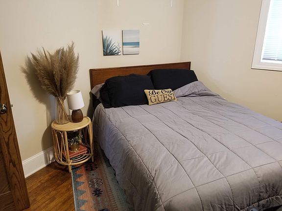 Bedroom easily fits a king size bed with dresser.