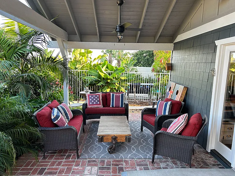 Relax under the outdoor veranda with family and friends