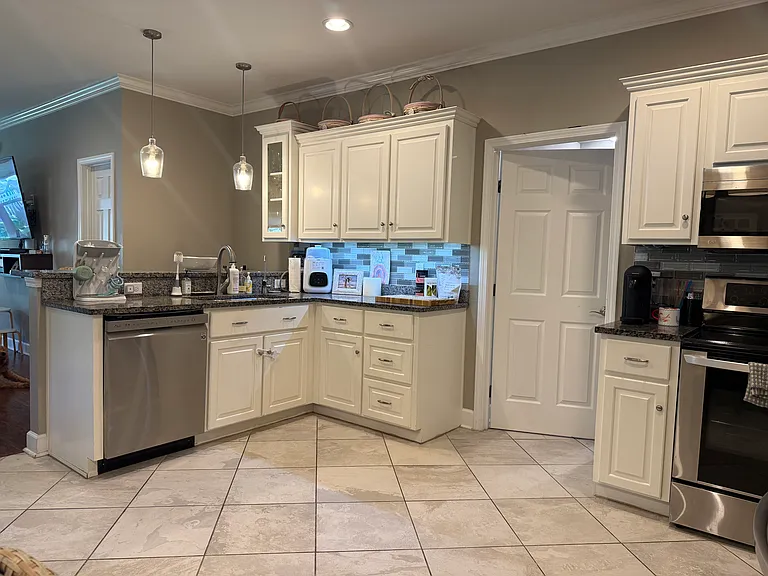 Kitchen with laundry area and bathroom