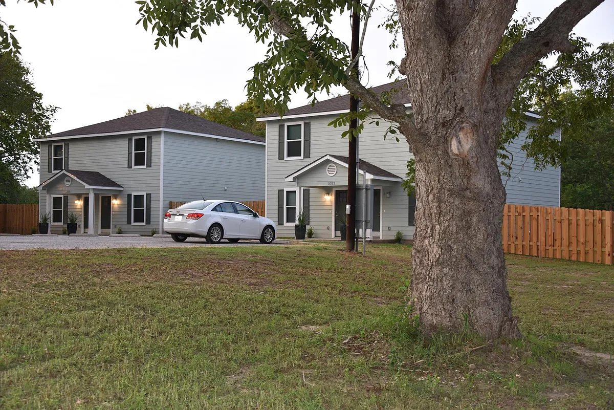 Unit 4 is on the far right side and has the largest backyard. - 1033 E Milam St
