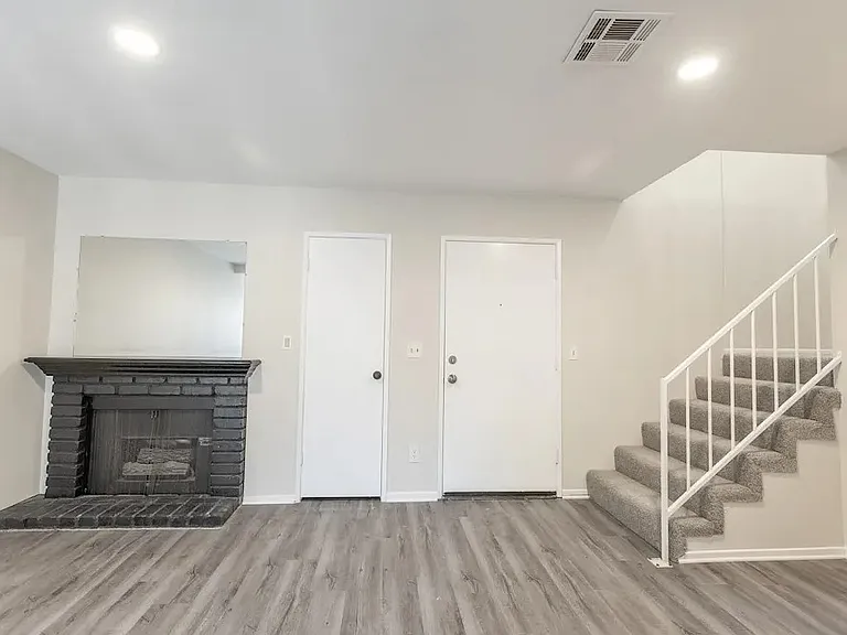 living area and stairs to bedroom. units vary
