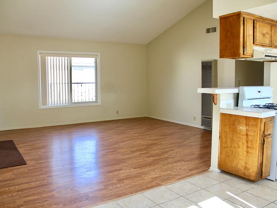 Vaulted ceilings, skylights and upstairs unobstructed views give light to a very spacious open concept living area.