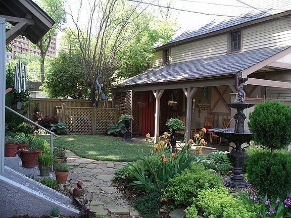 Back yard garden and carriage house