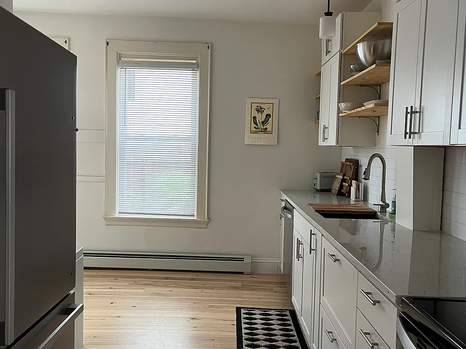 Kitchen - new stainless appliances, cabinets, and granite countertop. Dishwasher included.