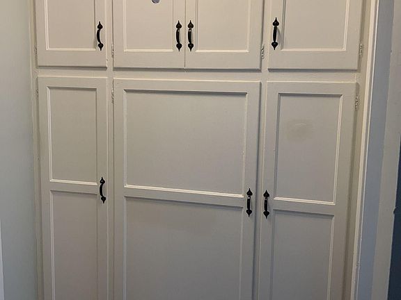 Hallway built-in cabinets and closet