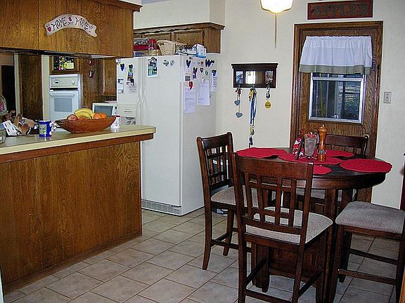 Tiled kitchen and breakfast room is family friendly