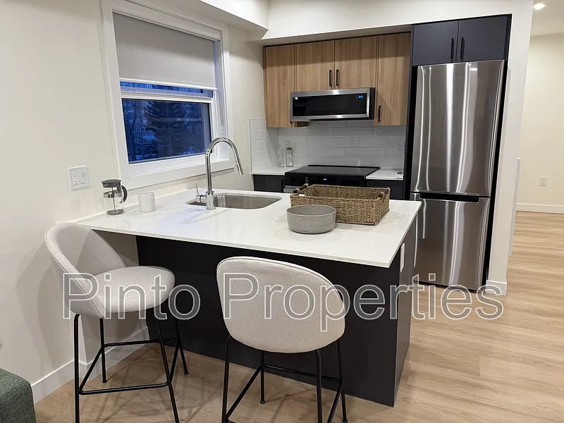 Building Photo - 8615 108th St NW #412