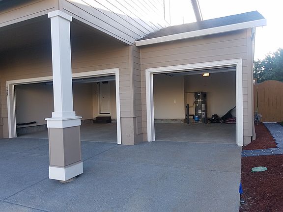3-car garage with EV charging outlet.