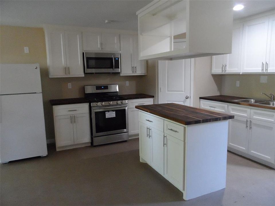Custom kitchen- butcher block ,gas oven with grill