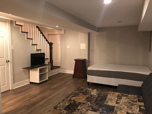 Ample room for a bed and other furniture. Good sized closet under the stairs.