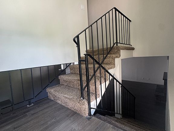 Split level entryway - Up to bedrooms and bonus room, Down to living areas and kitchen.