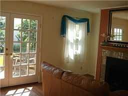 French doors to rear deck w/fig, lemon, lime and avocado trees