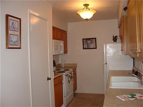 Kitchen with new microwave.