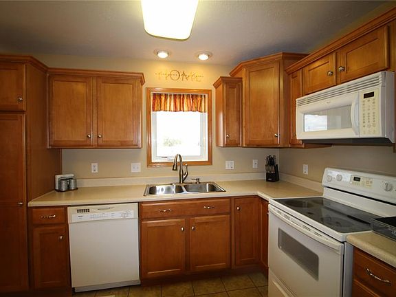 Refrigerator, Stove, microwave & dishwasher all remain