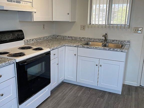 Kitchen in one of units