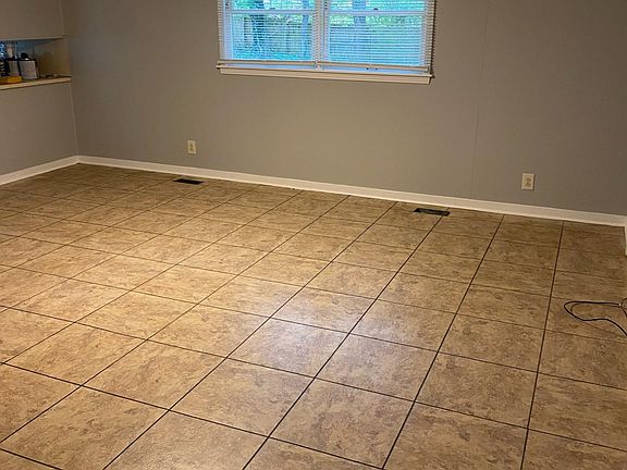 Large Den open to breakfast area and kitchen