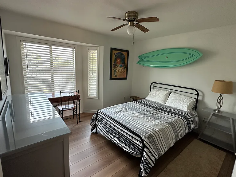 North guest room with desk
