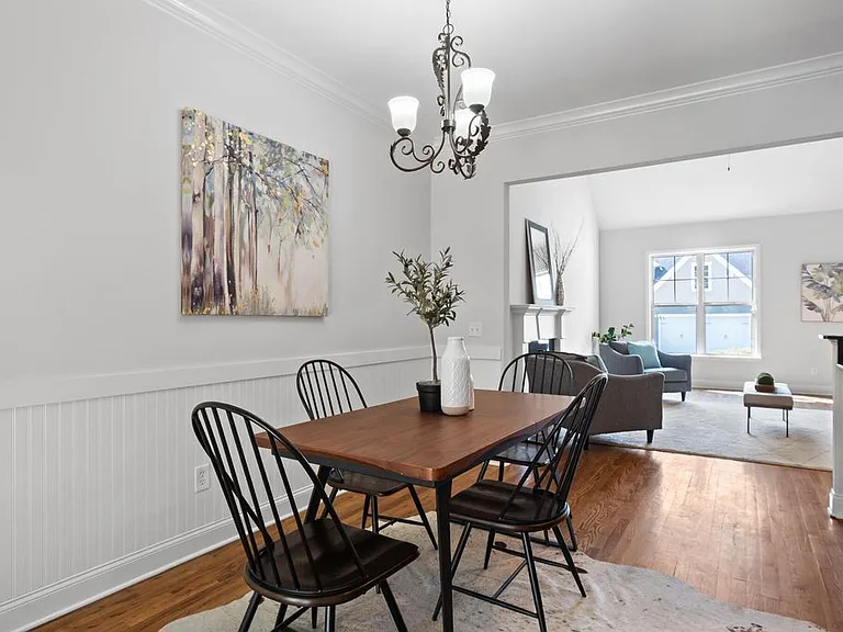 Open concept Living, Dining and kitchen great room with vaulted/high ceilings.