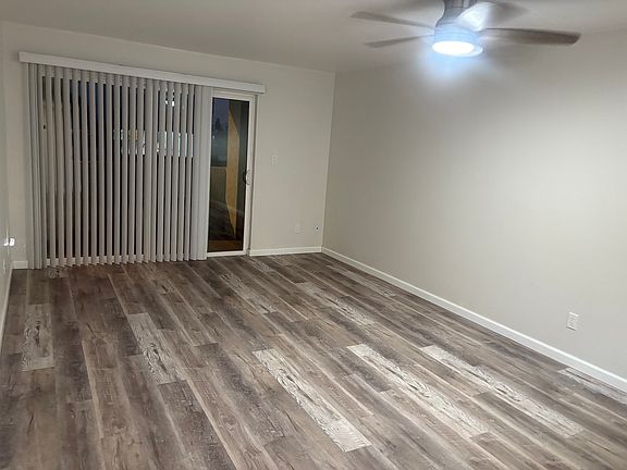 View from Inside Front Door towards Back of Living Room, Sliding Door to Back Porch