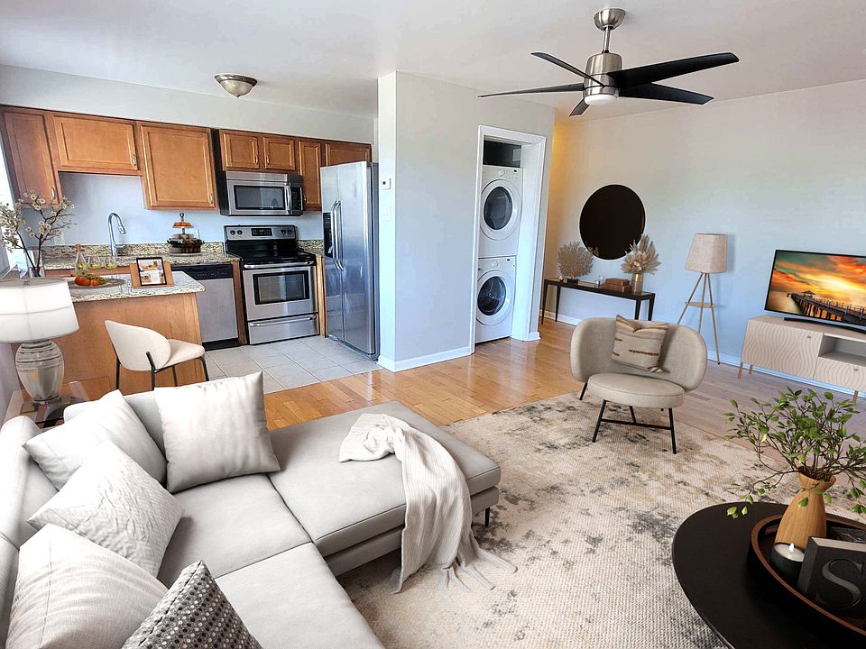 Showing washer & dryer door open. Sliding door to hide unit.