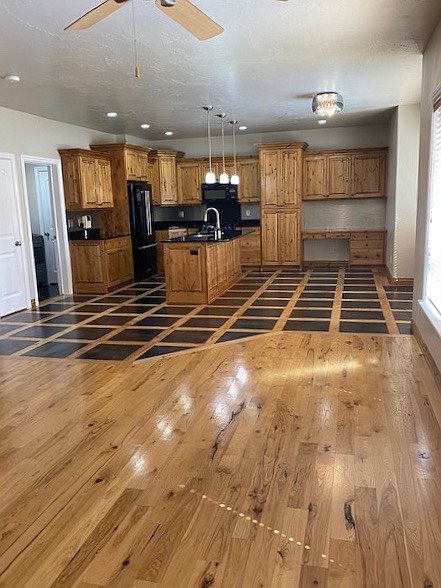 great room looking to kitchen area