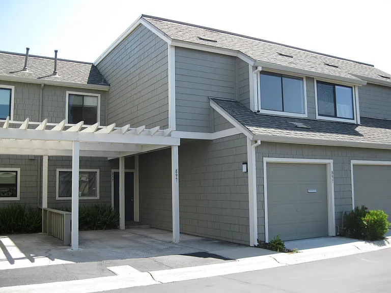 Townhouse has one secure garage plus car port