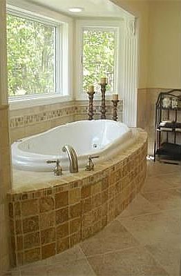 Master spa tub overlooking yard
