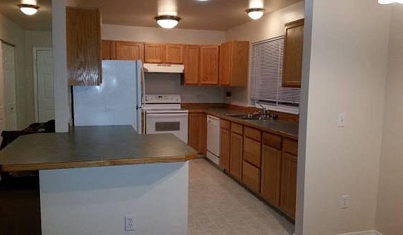 Large Kitchen with range/oven, dishwasher, fridge.  Large co