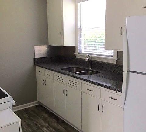 Updated kitchen with granite and new appliances.