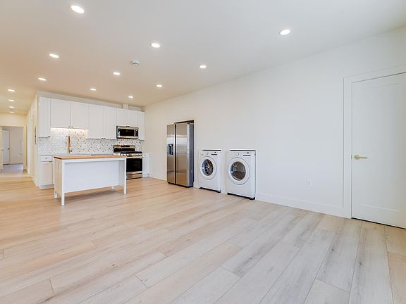 Open concept kitchen with a butcher block island