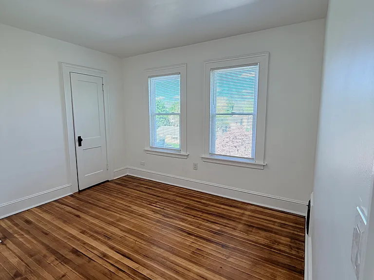 Third bedroom left of bathroom