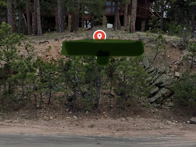 This is the view of the house from the street. Very private.