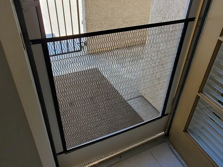 Screen door to private side patio