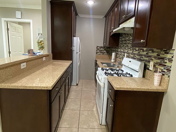 5th image of 9608 Olive St APT E