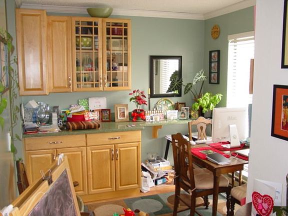 Dining room with extra cabinets/desk