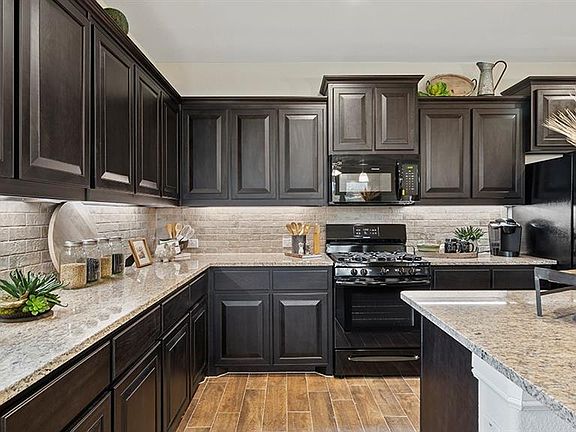 Photos shown here may not depict the specified home & features included are for illustration purposes only