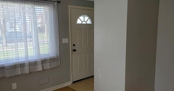 Front entrance into living room.