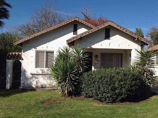 Old photo of the house before construction. Hasn't been watered in months