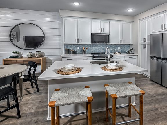 Kitchen in the Residence 2 floorplan at Cielo by Meritage Homes in San Marcos, CA.