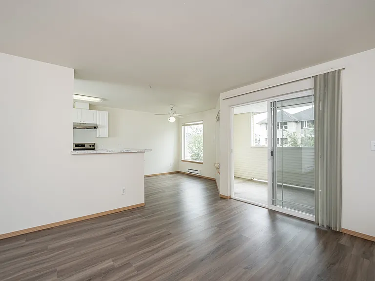 Bright, open living spaces with private balcony access.