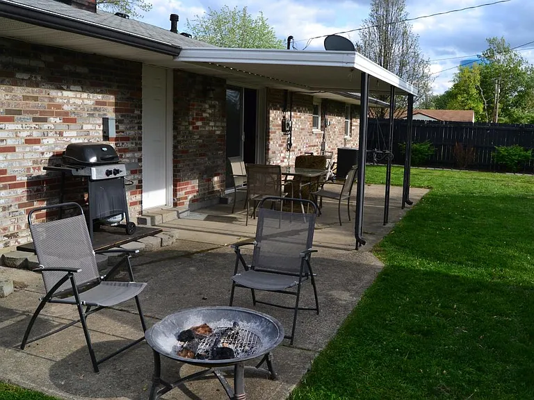 Covered patio with overhang for grill