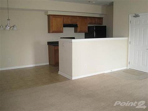 Ceramic Tile entrance; Great room combination of living room, dining area, and kitchen.