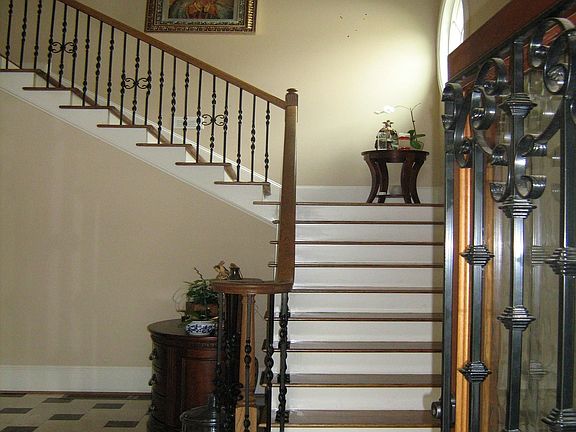 Beautiful walk up stairs off the foyer