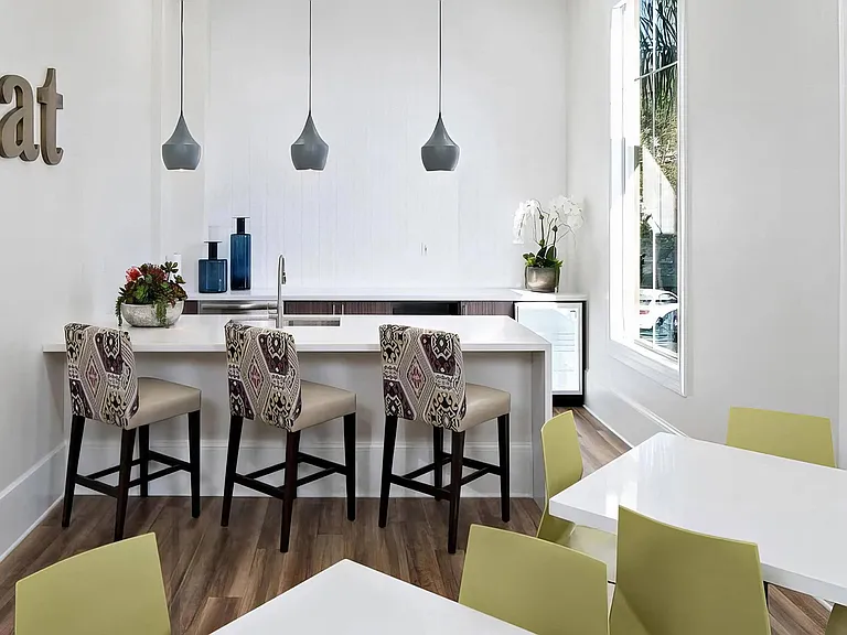 Community Workspace with Large Gathering Tables and Kitchen Island Seating