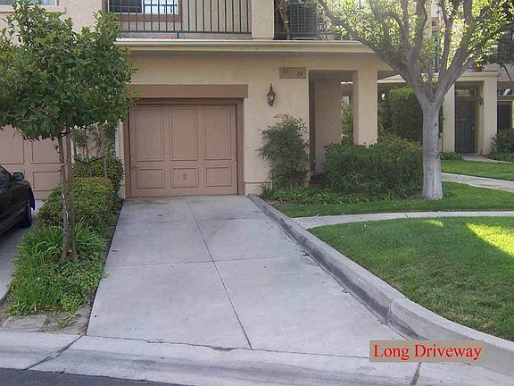 Long Driveway w/ 1 car Garage