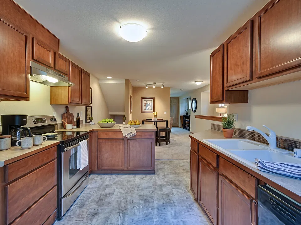 The peninsula opens straight through to the dining area, so cooking never means being shut away from guests.