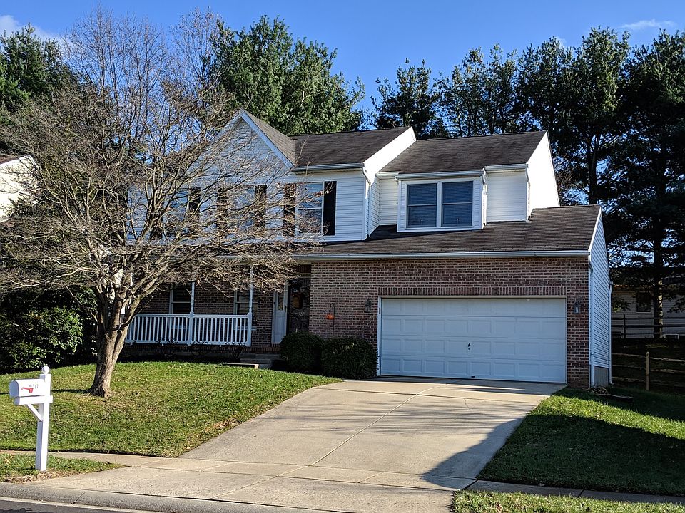 House w/ Pink Dogwood Tree