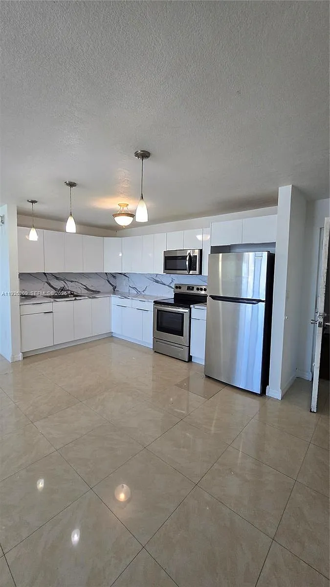 Building Photo - 14830 Naranja Lakes Blvd #A4N